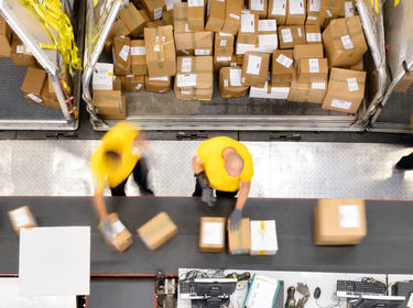 Workers picking products in a Prologis warehouse